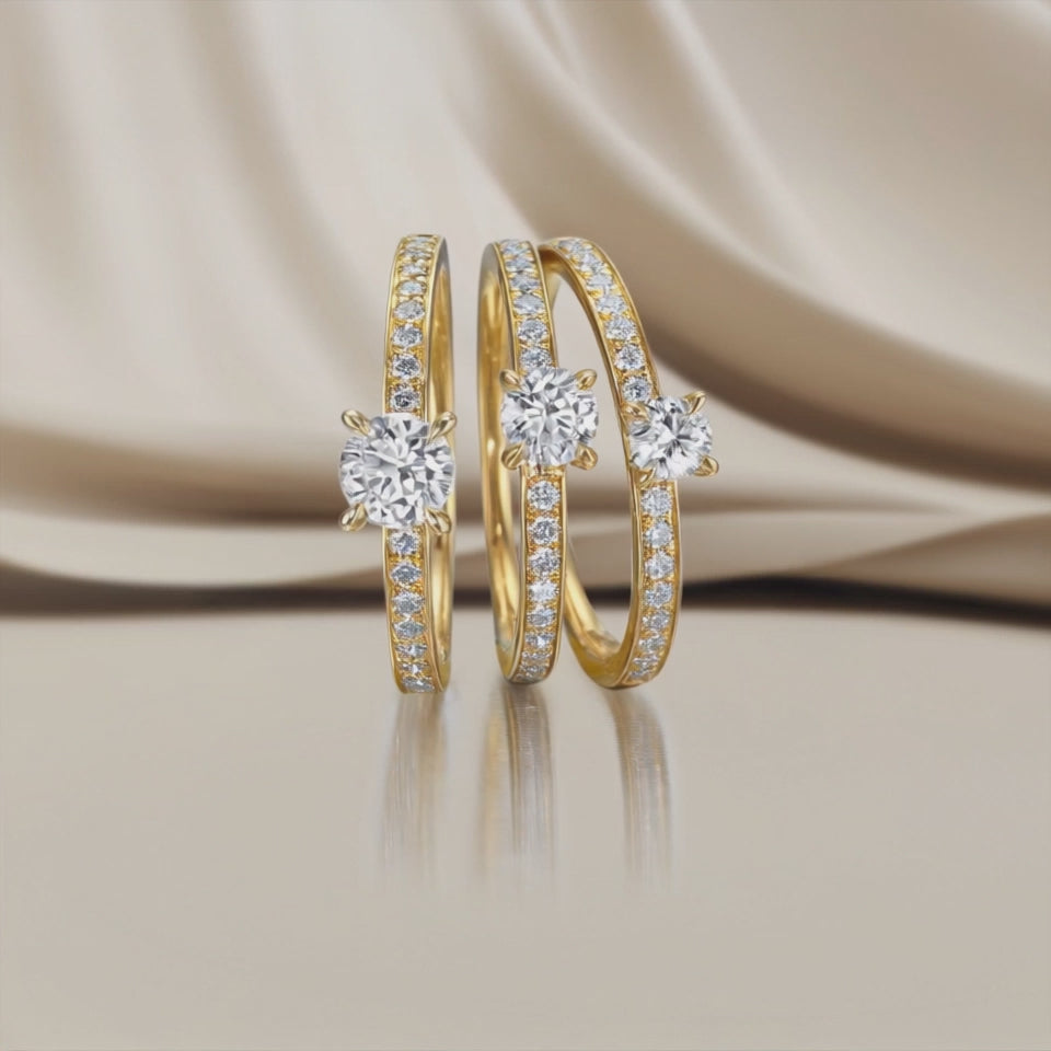 Solitär Ring 750/18 K Gelbgold Diamant weiss, 0.30 ct, Brillantschliff, w-si, Diamant weiss, 0.20 ct, 18 Steine, Brillantschliff, w-si