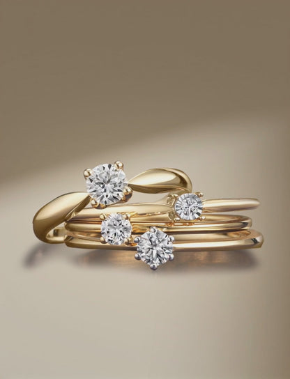 Solitär Ring 750/18 K Gelbgold, 750/18 K Weissgold Diamant 0.15 ct, w-si